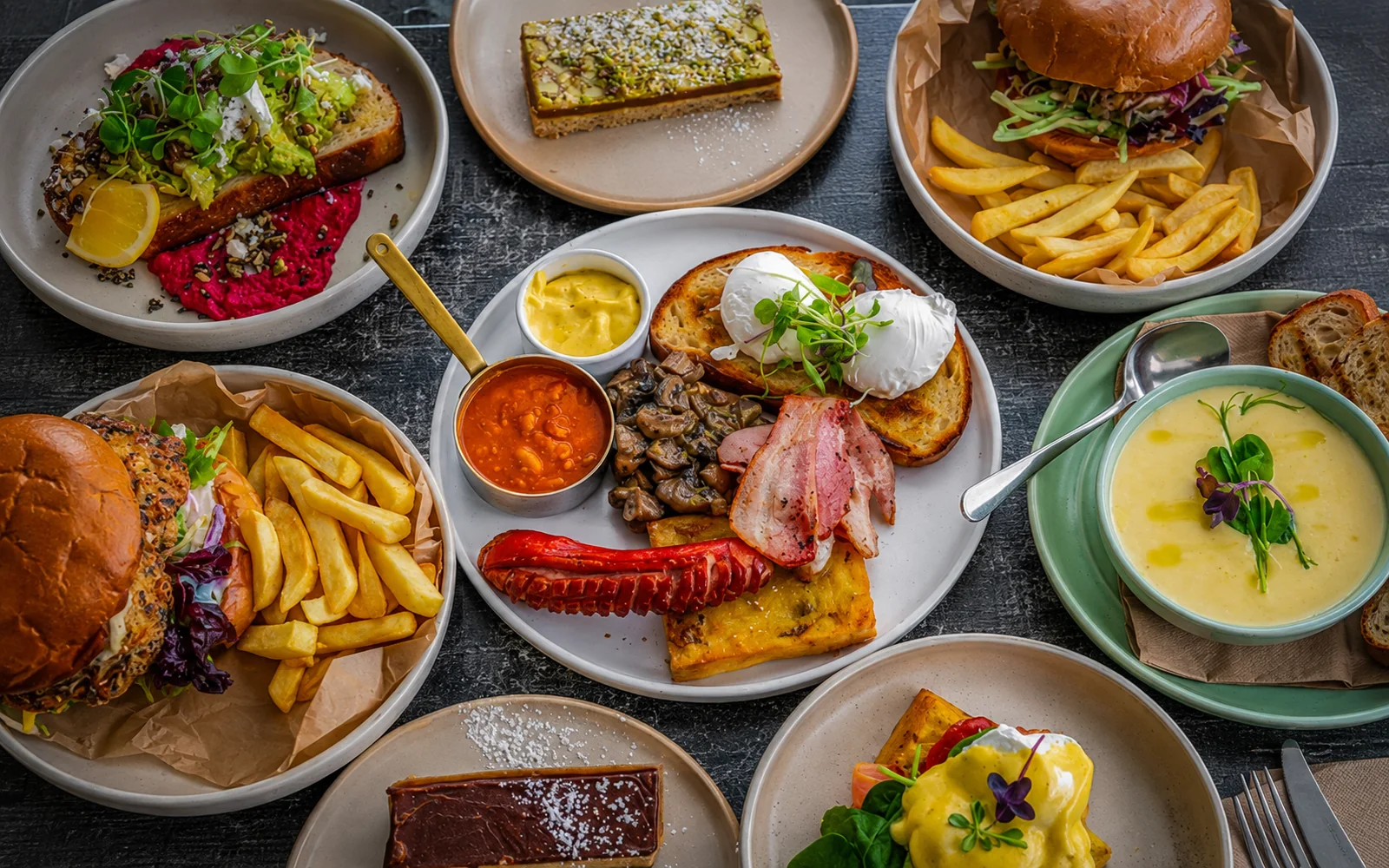 A table filled with dishes at Hey Jude Cafe